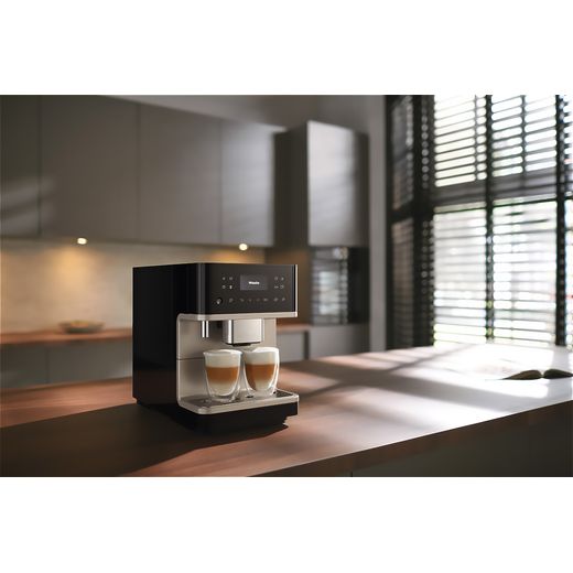 Miele CM6360 Coffee Machines Obsidian Black / Clean Steel Metallic - Coffee machine in kitchen shot